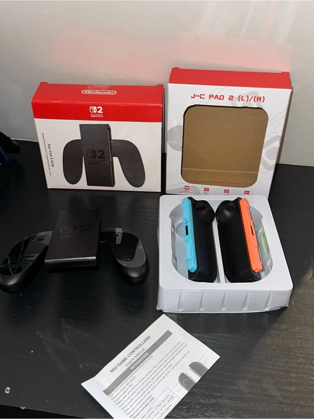 Nintendo Wireless Joy-Con Blue and Orange Accents with Nintendo game grip